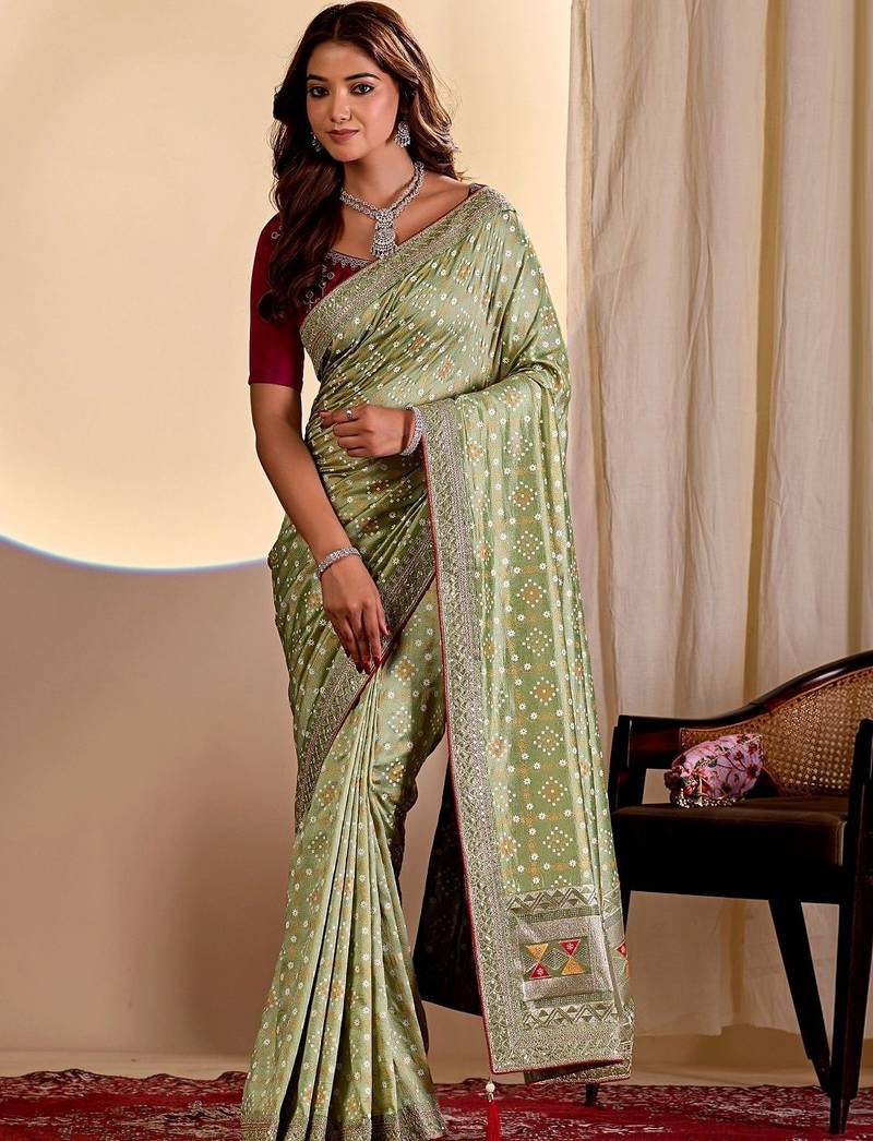 Green bandhani printed embroidered silk blend saree with unstitched blouse piece