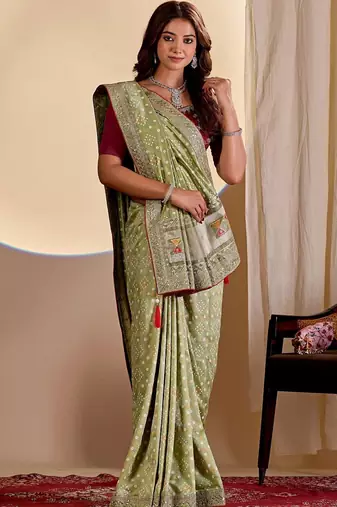 Green bandhani printed embroidered silk blend saree with unstitched blouse piece