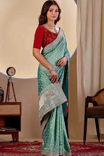 Teal bandhani embroidered silk blend designer saree