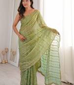 Lime light green satin ethnic embellished party wear matching blouse sarees