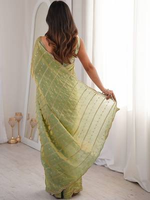 Lime light green satin ethnic embellished party wear matching blouse sarees 2