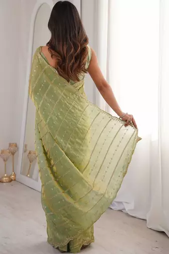 Lime light green satin ethnic embellished party wear matching blouse sarees