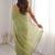 Lime light green satin ethnic embellished party wear matching blouse sarees