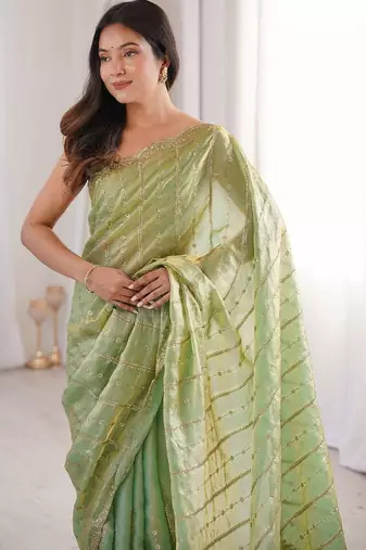 Lime light green satin ethnic embellished party wear matching blouse sarees