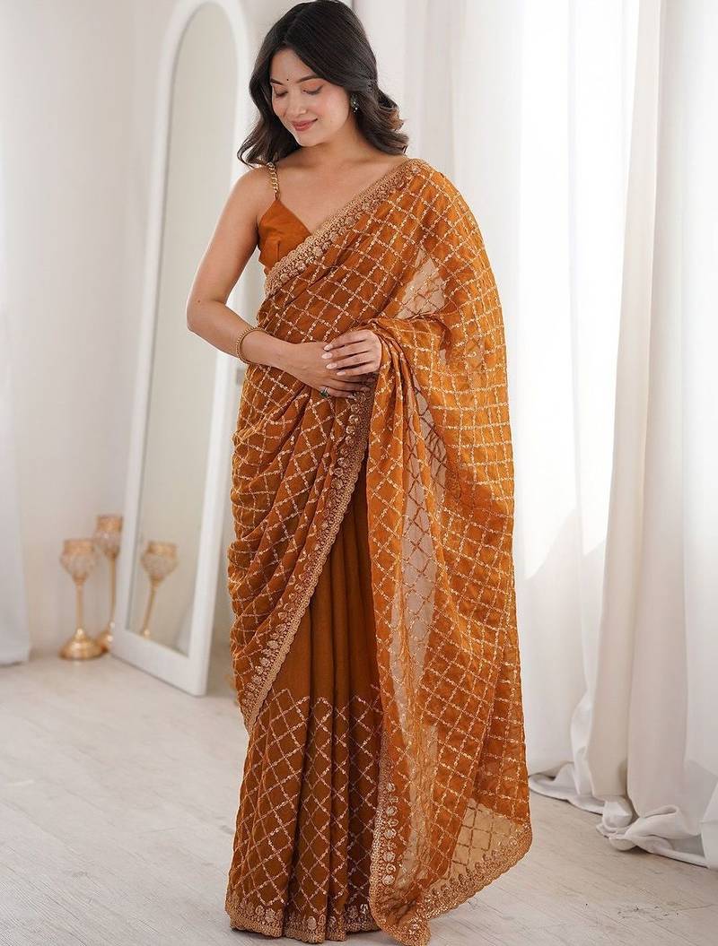 Brown bronze tissue ethnic embellished festive wear matching blouse sarees