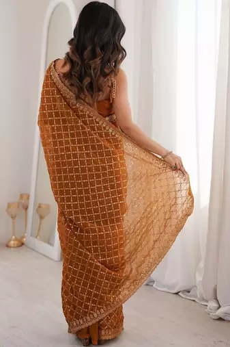 Brown bronze tissue ethnic embellished festive wear matching blouse sarees