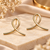 Gold-tone ribbon loop stud earrings, anti-tarnish jewellery