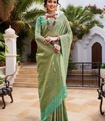 Green woven design zari chanderi saree with blouse piece