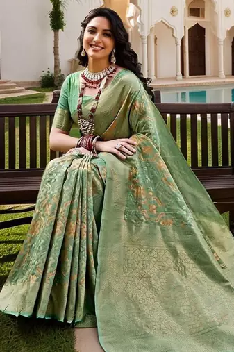Green woven design zari chanderi saree with blouse piece