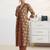 libas rust floral printed a-line suit set with dupatta