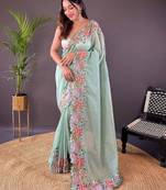 Green embroidered tissue saree