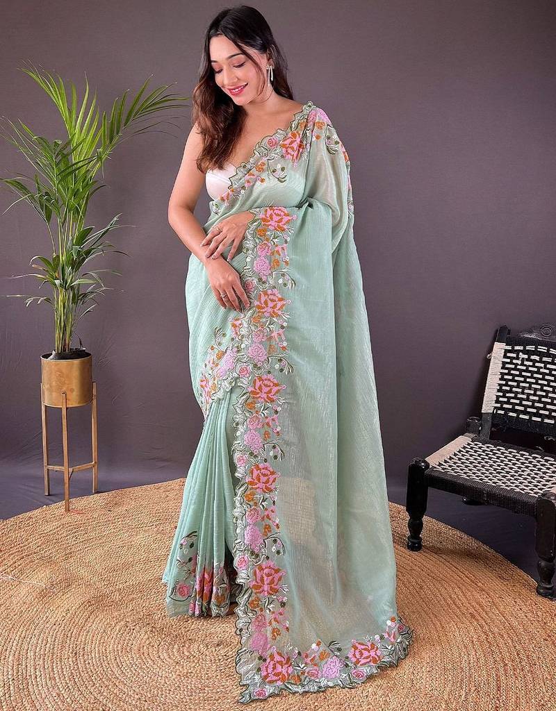 Green embroidered tissue saree