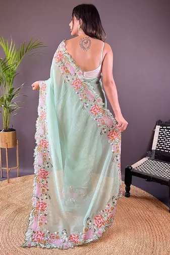Green embroidered tissue saree