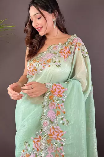 Green embroidered tissue saree
