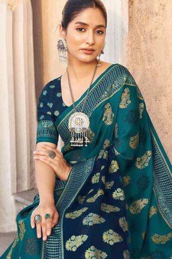 Teal ethnic motifs zari poly georgette saree