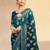Teal ethnic motifs zari poly georgette saree