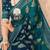 Teal ethnic motifs zari poly georgette saree