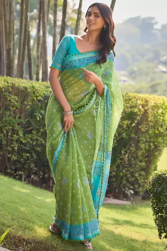 Green ethnic motifs printed saree
