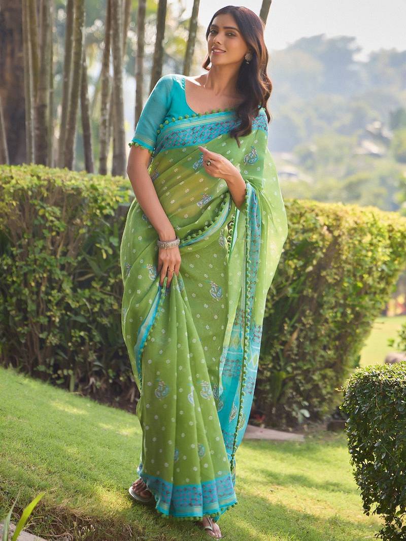 Green ethnic motifs printed saree