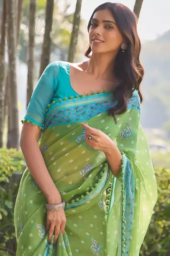Green ethnic motifs printed saree