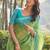 Green ethnic motifs printed saree