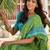 Green ethnic motifs printed saree