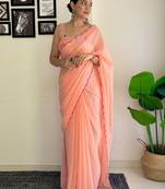 Peach embellished  georgette saree