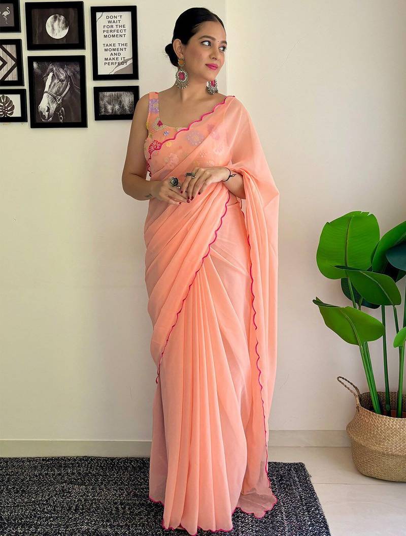 Peach embellished  georgette saree