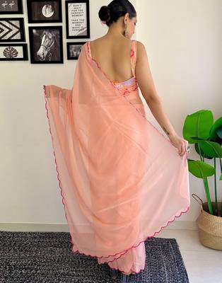 Peach embellished  georgette saree 3