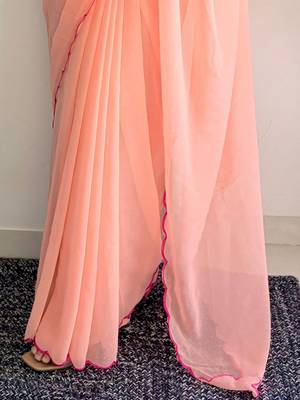 Peach embellished  georgette saree 5