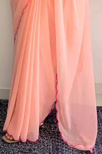 Peach embellished  georgette saree
