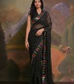 Black black & red embellished sequinned  georgette saree