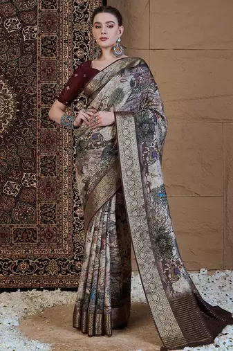 Beige woven design zari silk blend sungudi saree