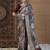 Beige woven design zari silk blend sungudi saree
