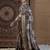 Beige woven design zari silk blend sungudi saree
