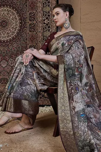 Beige woven design zari silk blend sungudi saree