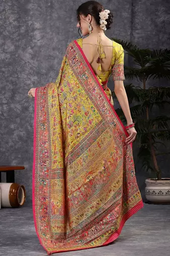 Yellow ethnic motifs printed banarasi saree with matching blouse