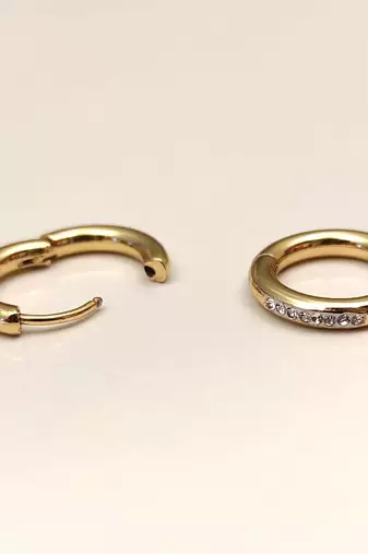Anti-tarnish, huggie hoop style, crystal embellished, hinged closure, women's jewellery