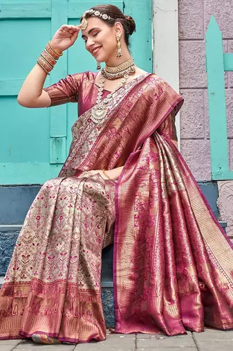Pink ethnic motifs woven design zari detail kanjeevaram saree
