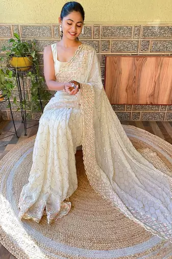Off white off white embellished sequinned  georgette saree