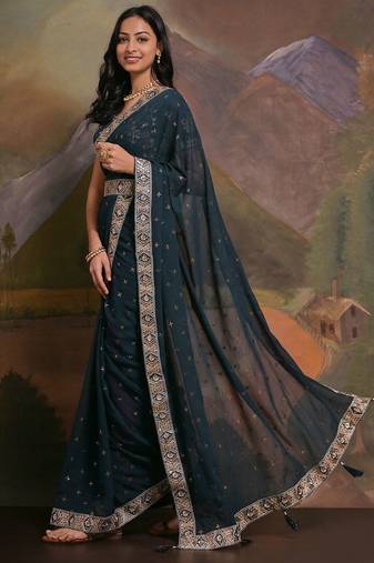 Teal teal & gold-toned embellished embroidered  georgette saree