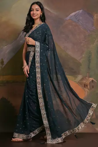 Teal teal & gold-toned embellished embroidered  georgette saree