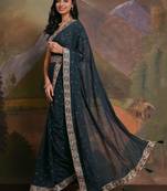 Teal teal & gold-toned embellished embroidered  georgette saree