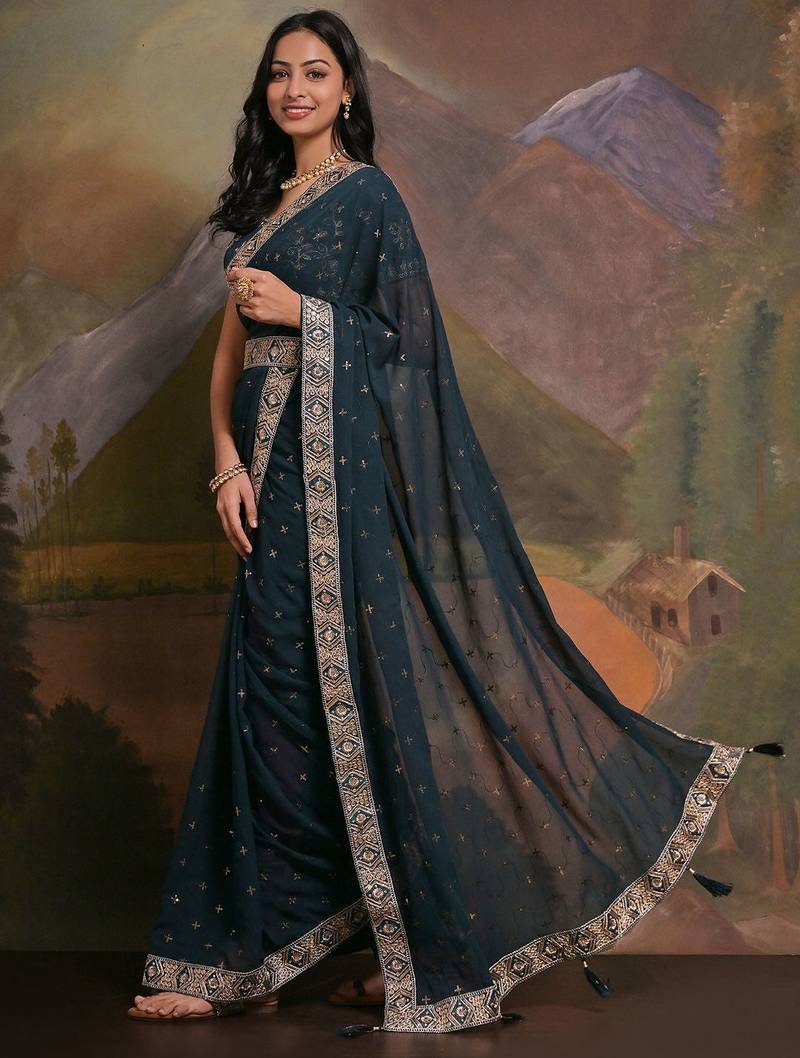 Teal teal & gold-toned embellished embroidered  georgette saree
