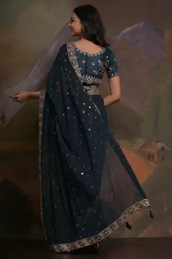 Teal teal & gold-toned embellished embroidered  georgette saree