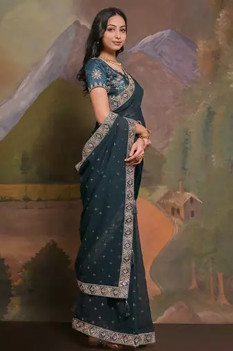 Teal teal & gold-toned embellished embroidered  georgette saree