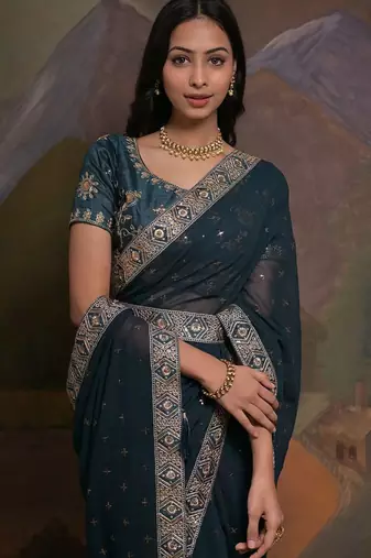 Teal teal & gold-toned embellished embroidered  georgette saree