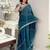 Teal ethnic motifs embroidered organza saree