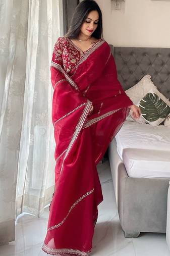 Maroon sequinned embroidered organza saree