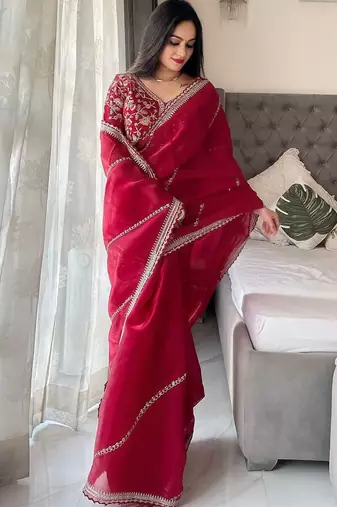 Maroon sequinned embroidered organza saree